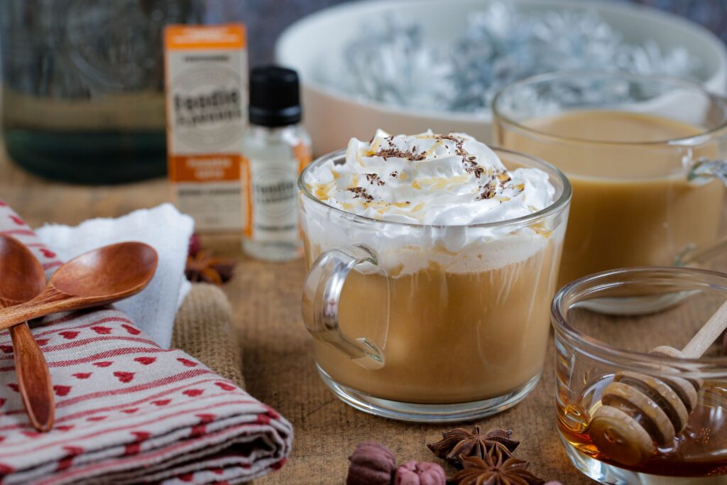 fall non-alcoholic drinks pumpkin spice latte and ingredients on a table